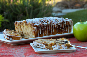 Cinnamon Apple Fritter Bread is a cinnamon & vanilla quick bread layered with apples and a brown sugar & cinnamon mixture, then topped with vanilla glaze.