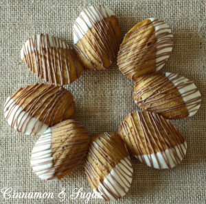 Pumpkin Spiced Madeleines are cake-like cookies dipped in white chocolate & drizzled with chocolate. Elegant enough for guests, the kids will love them too.