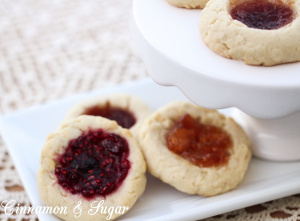 Josie's Jelly Cookies are tender shortbread cookies filled with your favorite flavor of jam, making them beautiful & elegant with the jeweled-toned center.