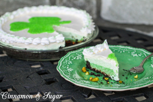 Easy no-bake Triple Layer Pistachio Pie: Oreo crust, fudgy layers of chocolate & crunchy pistachios, topped with creamy layers of pudding & whipped topping. 