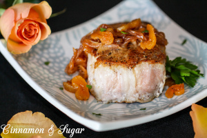 Seared Pork Chops with Apricot Brandy Sauce: succulent, flavorful pork served with an elegant jewel-toned pan sauce -- company worthy without being time consuming! Recipe shared with permission granted by Leslie Karst, author of DYING FOR A TASTE. 