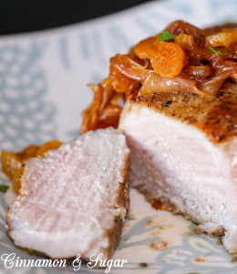 Seared Pork Chops with Apricot Brandy Sauce: succulent, flavorful pork served with an elegant jewel-toned pan sauce -- company worthy without being time consuming! Recipe shared with permission granted by Leslie Karst, author of DYING FOR A TASTE. 