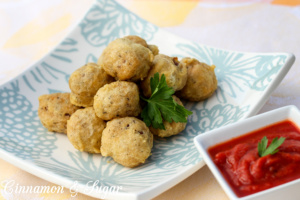 Talia's Deep-Fried Meatballs are delicious golden brown morsels that are perfect appetizers or a casual main course. These meatballs will become a favorite!