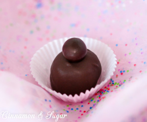 Deep, dark chocolate infused with espresso powder, then topped with a chocolate covered espresso bean, Mocha Truffles give you an incredible jolt of flavor! Recipe shared with permission granted by Kathy Aarons, author of TRUFFLED TO DEATH.