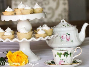 Sweet-tart lemony filling nestled in mini shortbread crusts make these Lemon Tarts the perfect size to serve for a light dessert or afternoon tea. Recipe shared with permission granted by Krista Davis, author of THE DIVA SERVES HIGH TEA.