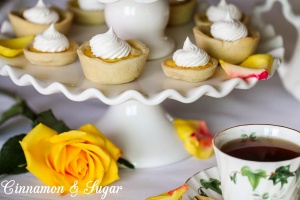 Sweet-tart lemony filling nestled in mini shortbread crusts make these Lemon Tarts the perfect size to serve for a light dessert or afternoon tea. Recipe shared with permission granted by Krista Davis, author of THE DIVA SERVES HIGH TEA.