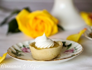 Sweet-tart lemony filling nestled in mini shortbread crusts make these Lemon Tarts the perfect size to serve for a light dessert or afternoon tea. Recipe shared with permission granted by Krista Davis, author of THE DIVA SERVES HIGH TEA.