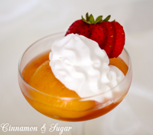 Fresh summer peaches are poached in white wine scented with honey, lemon, and vanilla. Tangy whipped sour cream provides richness to tantalize your taste buds.