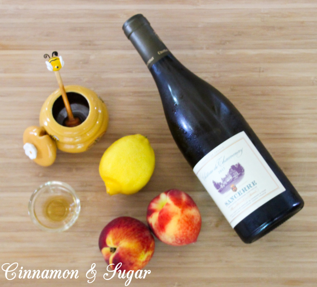 Peaches Poached in White Wine Cinnamon and Sugar