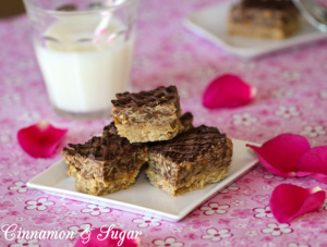 Preacher Cookies are no-bake bar cookies with layers of peanut butter & chocolate then topped with chocolate drizzle. Quick to mix up using pantry staples. 