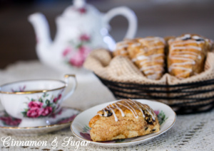 Whiskey and cinnamon simmered raisins infuse these Drunken Raisin Scones with loads of spiced flavor while the flaky, tender pastry will melt in your mouth!