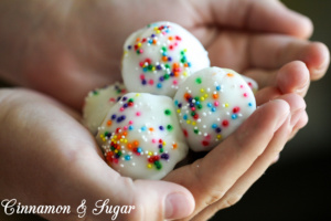 Josie's Genettis are soft, cake-like traditional Italian cookies formed into a beehive shape then brushed with sweet frosting and sprinkled with nonpareils.