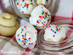 Josie's Genettis are soft, cake-like traditional Italian cookies formed into a beehive shape then brushed with sweet frosting and sprinkled with nonpareils.