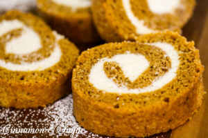 Pumpkin Roll Cake combines a thin layer of spiced pumpkin cake with creamy, tangy cream cheese rolled inside. Delicious and picture perfect presentation!