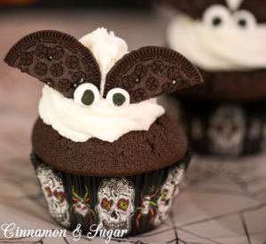 Spooky Surprise Cupcakes are delicious chocolate cupcakes encasing a gooey chocolate chip cookie dough center and topped by fluffy vanilla buttercream!