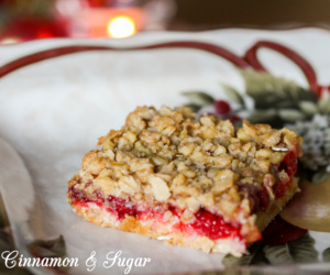 Suzanne's Cherry Cake Bars are part cake, part cookie & super easy to make starting with a boxed cake mix. Cherry pie filling adds colorful holiday cheer!