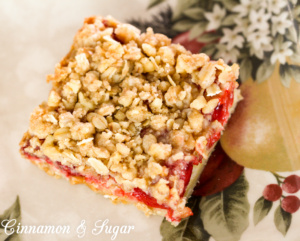 Suzanne's Cherry Cake Bars are part cake, part cookie & super easy to make starting with a boxed cake mix. Cherry pie filling adds colorful holiday cheer!