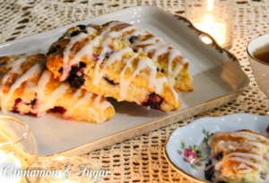 Blueberry Scones with Lemon Glaze replaces heavy cream with Greek yogurt resulting in a luscious, flavorful pastry with fewer calories. 