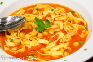 Sullo Scio is a soup from the Pisa, Italy region. Simple ingredients like garlic, rosemary, tomatoes, chick peas, and pasta combine for a satisfying dish. 