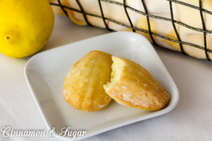 Elegant, cake-like Lemon Glazed Madeleine Cookies are an idea dessert to serve at luncheons or teas and delicious with bubbly Prosecco or a hot cup of tea!