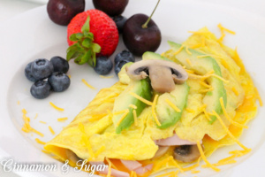 With mushrooms, ham and cheese, Grizzy's Go-To Omelet is a satisfying and hearty dish to serve for a quick breakfast, brunch, or even dinner. 