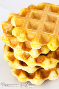 Breakfast made easy: refrigerated biscuits stuffed with cheesy eggs then quickly cooked in a waffle maker. Waffle Biscuits are perfect for on the go!