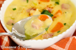 Cheesy Potato Chowder has plenty of vegetables and ham to make it a warm, comforting dish to serve before or after a chilly night of Trick-or-Treating!