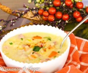 Cheesy Potato Chowder has plenty of vegetables and ham to make it a warm, comforting dish to serve before or after a chilly night of Trick-or-Treating!