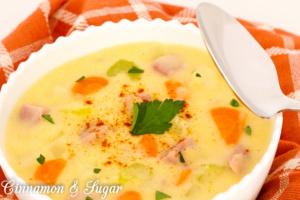 Cheesy Potato Chowder has plenty of vegetables and ham to make it a warm, comforting dish to serve before or after a chilly night of Trick-or-Treating!