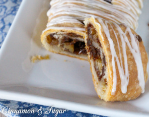 This Apple Strudel uses a couple unusual ingredients but the results are nothing but amazingly delicious! Sour cream and butter create the perfect flaky crust while crushed ginger cookies add body and a yummy flavor to the apple filling.