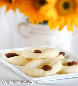 Lucy's White Almond Cookies uses only four simple ingredients plus whole almonds for garnishing to create a melt-in-your-mouth shortbread-style delectable treat! 