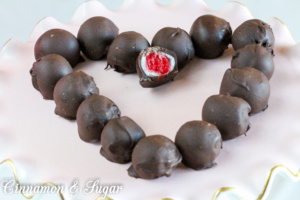 Mabel's Chocolate-Covered Cherry Bonbons are much easier to make than you might think! Bright maraschino cherries are wrapped in a simple home-made fondant then enrobed in melted chocolate chips. But the taste is so yummy you'll never want to purchase pre-made chocolate-covered cherries again!