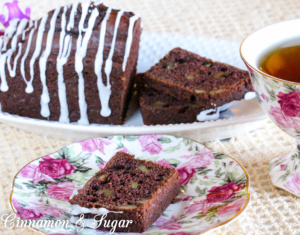 Sinfully Chocolate Tea Bread is a super easy to mix up quick bread. and a delightful treat that is perfect with a pot of tea! I loved the crunch of the walnuts with the dark chocolate bread while cake flour provides a nice light crumb. 