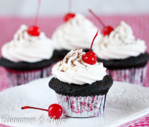 Black Forest Cupcakes are rich, dark chocolate cupcakes and are supremely moist. But the surprise is the cherry filling hiding beneath mounds of fluffy vanilla buttercream that puts the flavor of these treats over the top!