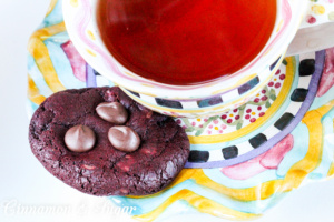 Red Velvet Crunchies has a cookie base of chocolate red velvet and a generous amount of chocolate chips added to the dough. Additional chocolate chips are pressed into the tops as soon as the cookies are done baking. These warm, gooey chocolate cookies will be a huge hit when served with an ice cold glass of milk.