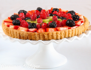 Sure to be a dessert that will impress your family and guests, Sugar Cookie Fruit Tart relies on convenience products to make it easy to prepare. The jewel-toned fresh fruit is complemented by the lemony cream cheese filling while the soft sugar cookie crust provides added sweetness.