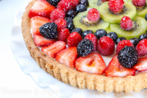 Sure to be a dessert that will impress your family and guests, Sugar Cookie Fruit Tart relies on convenience products to make it easy to prepare. The jewel-toned fresh fruit is complemented by the lemony cream cheese filling while the soft sugar cookie crust provides added sweetness.