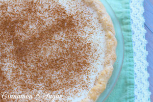 Sugar Cream Pie combines fresh dairy ingredients to create a creamy dessert providing both comfort and indulgence with a warm dusting of cinnamon on top.