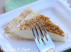 Sugar Cream Pie combines fresh dairy ingredients to create a creamy dessert providing both comfort and indulgence with a warm dusting of cinnamon on top.