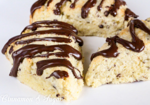 Dark Chocolate and Orange Scones combine two popular flavors in buttery scones while a drizzle of dark chocolate gives taste buds a sudden burst of flavor!