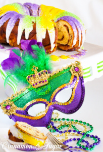 Canned cinnamon rolls layered into a bundt pan and then slathered with a brown sugar & cinnamon mixture before baking creates Easy-Peasy King (Bundt) Cake, a Mardi Gras tradition!