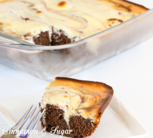 Sadie's Cheesecake Brownies is a moist chocolately base that mix up quickly. Easy, tangy cheesecake tops the brownies and is swirled for a marbling effect.