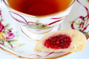 Jewel Brooch Cookies are easy to make with the jewel tones of the jam making these shortbread-style cookies a festive addition to any holiday cookie plate!