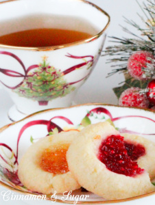 Jewel Brooch Cookies are easy to make with the jewel tones of the jam making these shortbread-style cookies a festive addition to any holiday cookie plate!