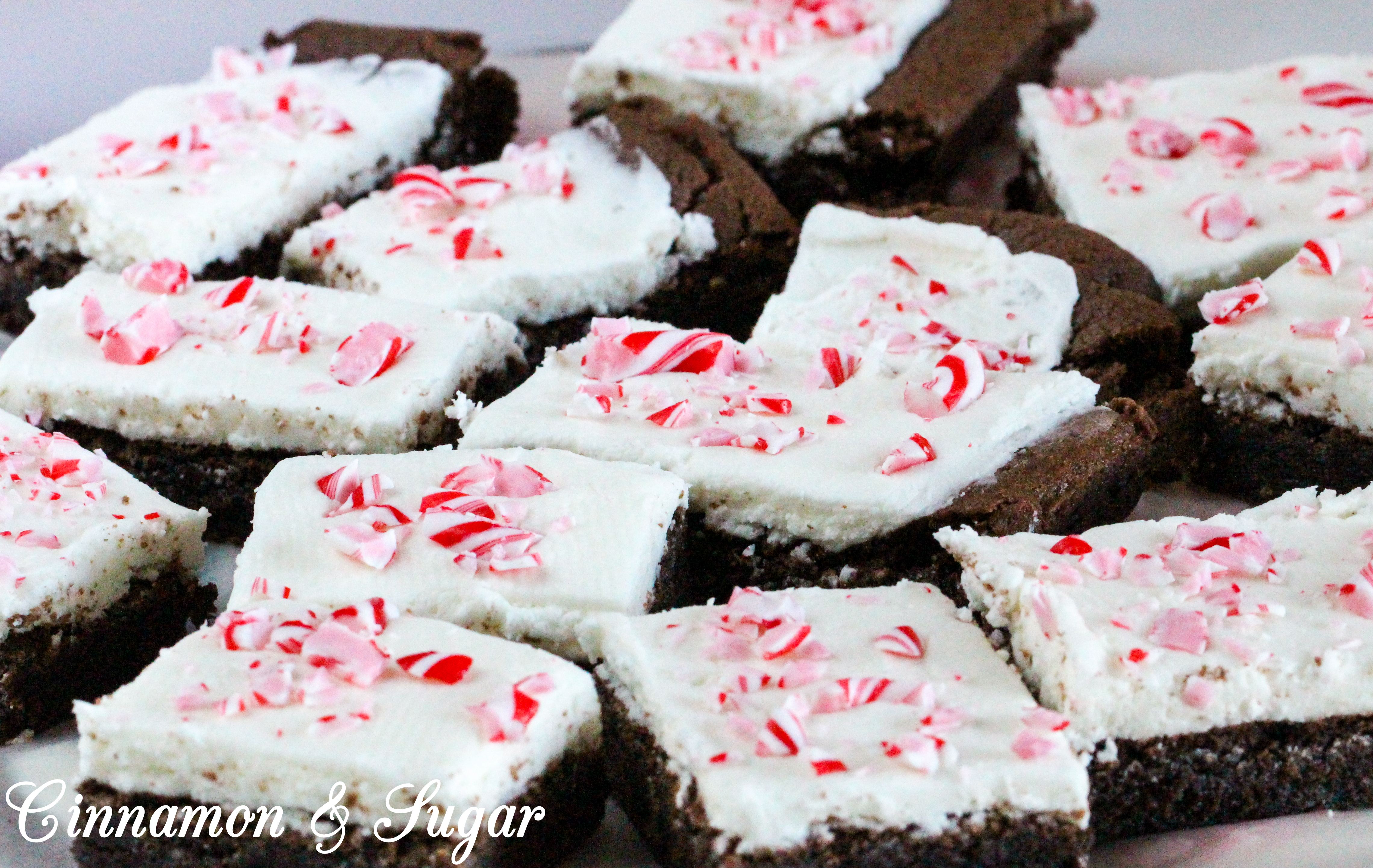 Candy Cane Brownies combine the yummy flavors of chocolate and peppermint while the added crunch of crushed candy canes sprinkled on top of the frosted brownies adds a festive touch. Recipe shared with permission granted by Catherine Bruns, author of GINGER SNAPPED TO DEATH.
