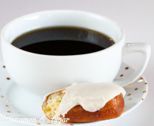 Cream-filled Maple Bars are yeasty deep-fried donuts that are filled with sweet vanilla cream then topped with maple frosting. Perfect with coffee or tea! 