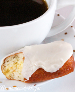 Cream-filled Maple Bars are yeasty deep-fried donuts that are filled with sweet vanilla cream then topped with maple frosting. Perfect with coffee or tea! 