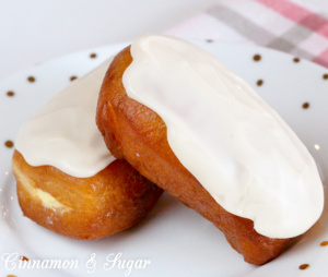 Cream-filled Maple Bars are yeasty deep-fried donuts that are filled with sweet vanilla cream then topped with maple frosting. Perfect with coffee or tea! 