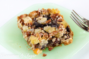 Layers of graham cracker crumbs, coconut, dates, cherries, pineapple, pecans, and sweetened condensed milk mix up in a jiffy to create sweet, chewy Church Basement Funeral Bars! 