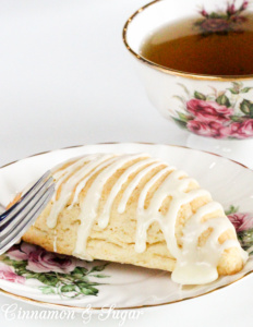 Eggnog Scones are flaky, buttery, and melt-in-your-mouth yummy! Perfect for the holidays or even a special treat no matter what time of year it is! Recipe shared with permission granted by Laura Childs, author of BROKEN BONE CHINA.